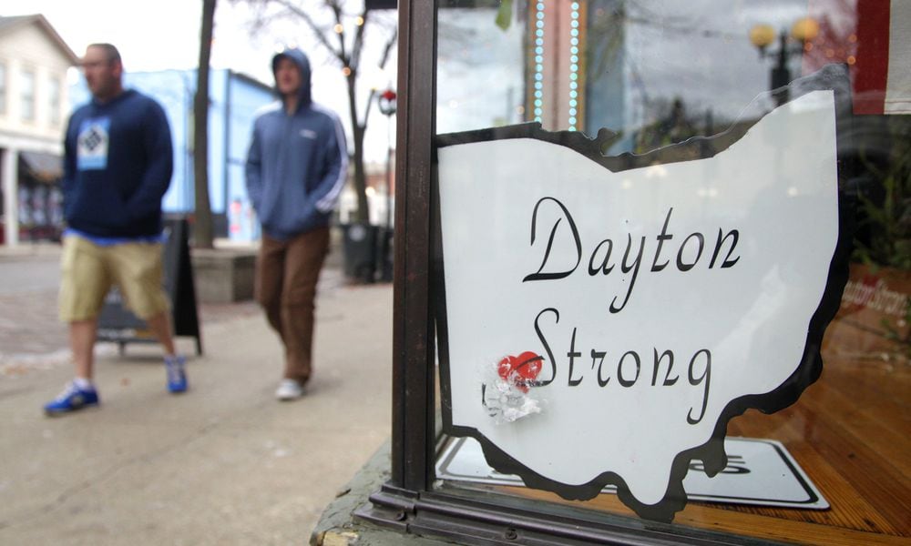 Uplifting messages are posted throughout Daytons Oregon District five months after the Aug. 4 mass shooting. LISA POWELL / STAFF