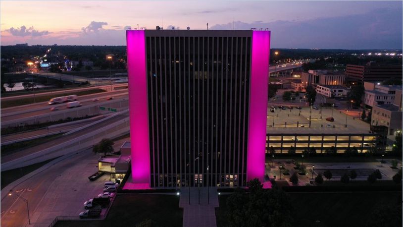 Nine bridges in Dayton and the Montgomery County Administration Building downtown will light up in rhodamine red – the signature color used by Iams pet food billionaire Clay Mathile in the Iams logo, pawprint and on packaging for the Eukanuba pet food line. CONTRIBUTED