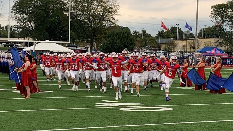 Carroll players hit Spoerl-Bartlett Field before Friday night’s home game vs. Tecumseh. Eric Frantz/CONTRIBUTED