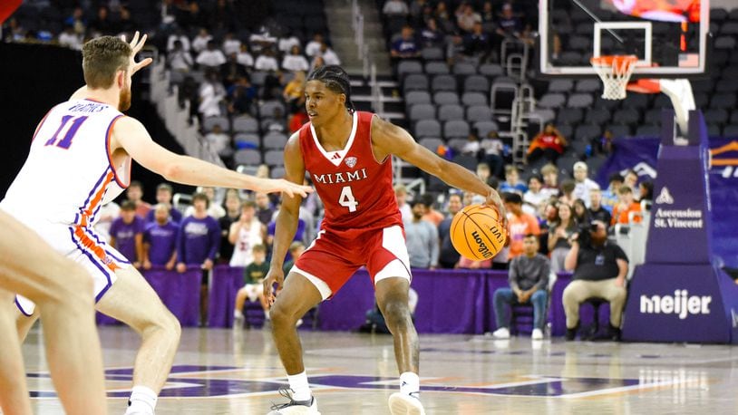 Miami's Darweshi Hunter vs. Evansville in Monday's season opener. Megan Walker/CONTRIBUTED