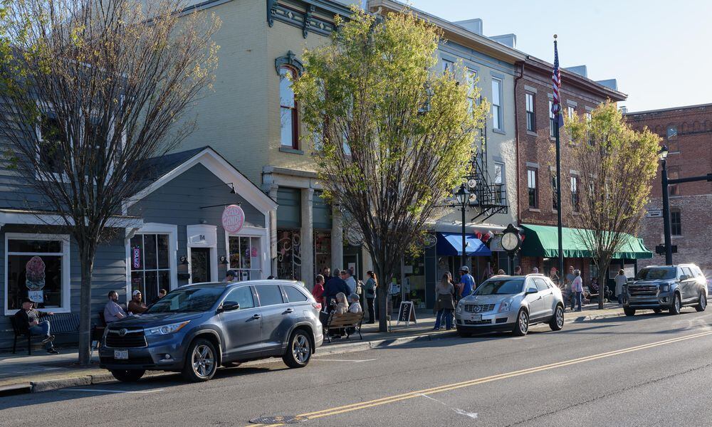 The Downtown Tipp City Partnership hosted the After the Dark Beer Crawl on Saturday, Apr. 13, 2024. Attendees sampled craft beers at shops and businesses on Main St. during the ticketed Second Saturday event. TOM GILLIAM / CONTRIBUTING PHOTOGRAPHER