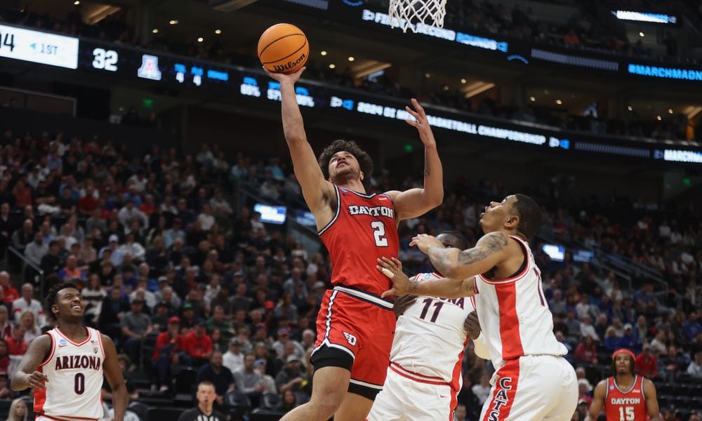 Dayton's Nate Santos shoots against Arizona in the second round of the NCAA tournament on Saturday, March 23, 2024, at the Delta Center in Salt Lake City, Utah. David Jablonski/Staff