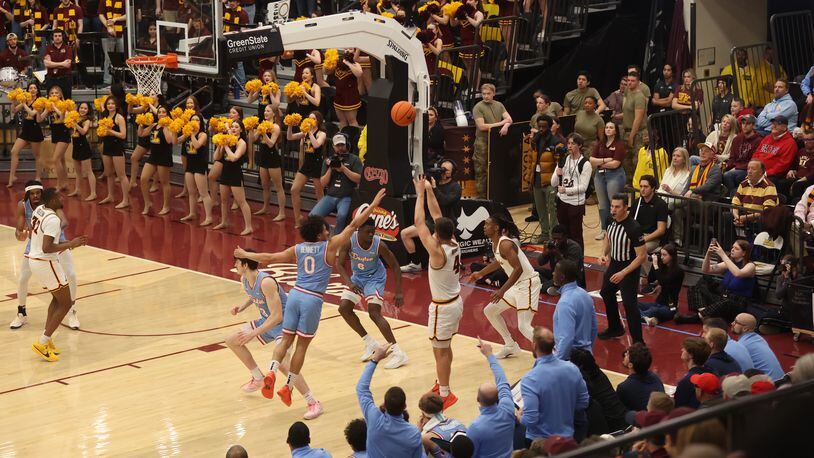 Loyola Chicago's Braden Norris is fouled on a 3-point attempt in the final seconds of the first half on Friday, March 1, 2024, at Gentile Arena in Chicago. David Jablonski/Staff