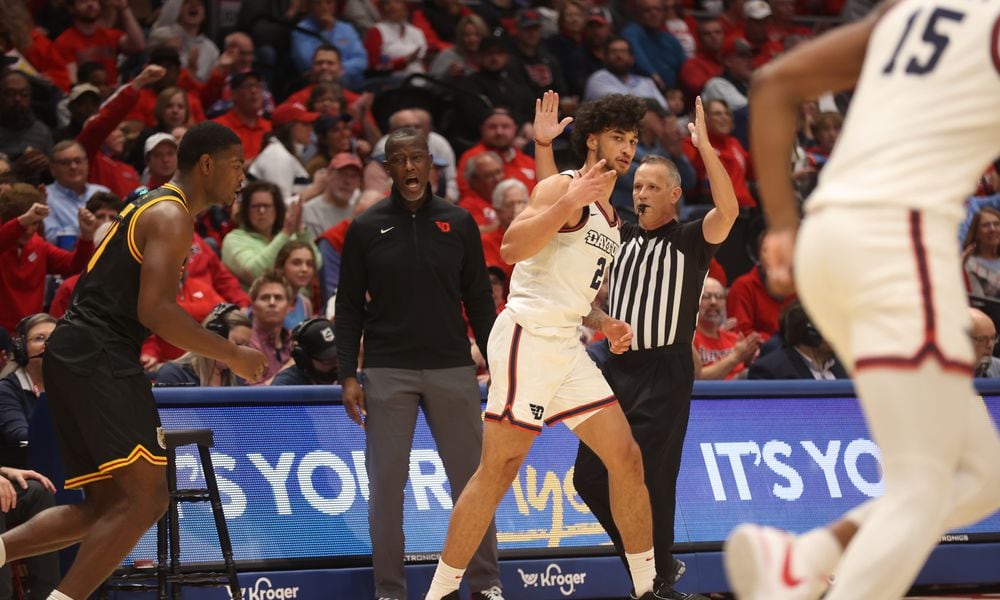 Dayton's Nate Santos celebrates after making a 3-pointer against Grambling State on Saturday, Dec. 2, 2023, at UD Arena. David Jablonski/Staff