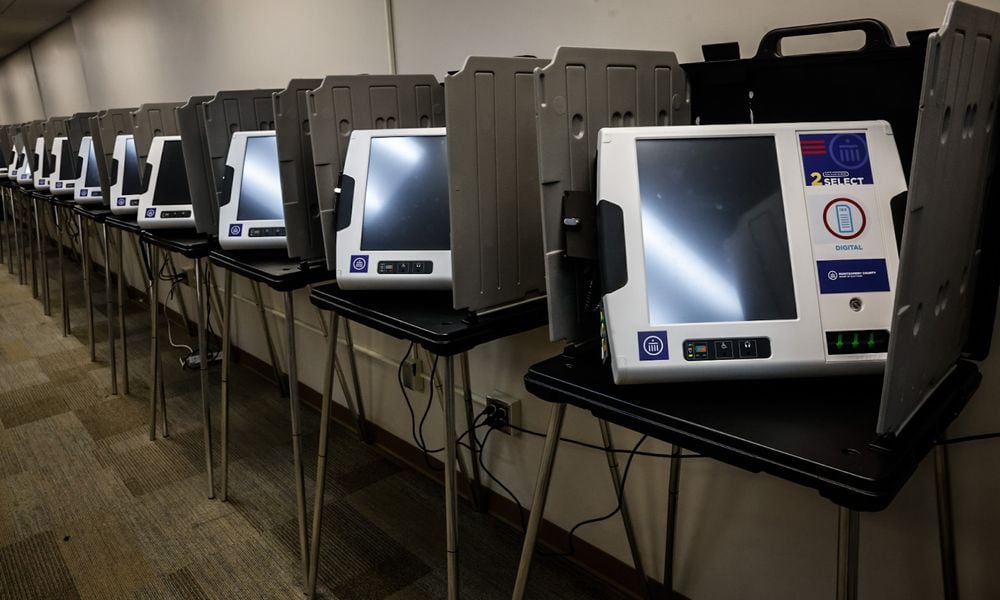 Electronic voting machines are lined-up and ready to go at the Montgomery County Board of Elections on East Third Street. JIM NOELKER/STAFF