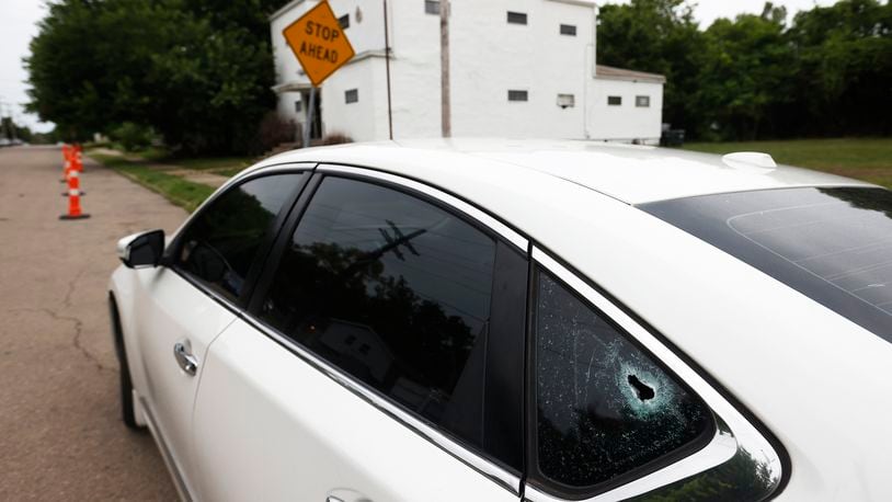 A man is dead Tuesday morning, July 16, 2024, after a shooting at the corner of South Conover and West Fifth streets near an afterhours bar that Dayton Police have had other incidents in the past. MARSHALL GORBY\STAFF