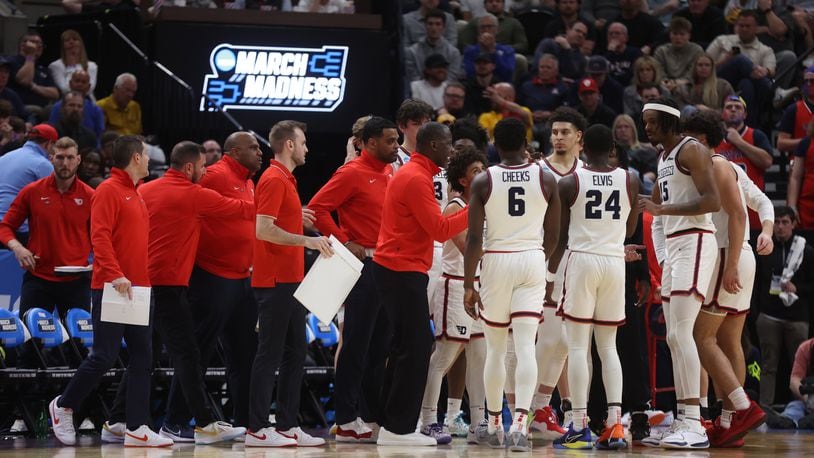 Dayton huddles during a game against Nevada in the first round of the NCAA tournament on Thursday, March 21, 2024, at the Delta Center in Salt Lake City, Utah. David Jablonski/Staff