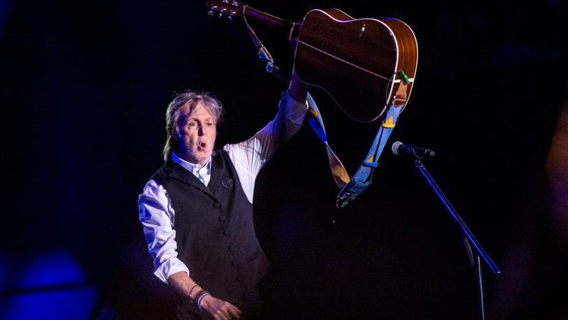 Paul McCartney, seen here performing at the 2022 Glastonbury Festival in Somerset, England, wrote his "Liverpool Oratorio" in collaboration with the late composer and conductor Carl Davis. The work, which premiered in 1991, will receive its first-ever operatic staging July 18-27 courtesy of Cincinnati Opera. (Photo by Joel C Ryan/Invision/AP, File)