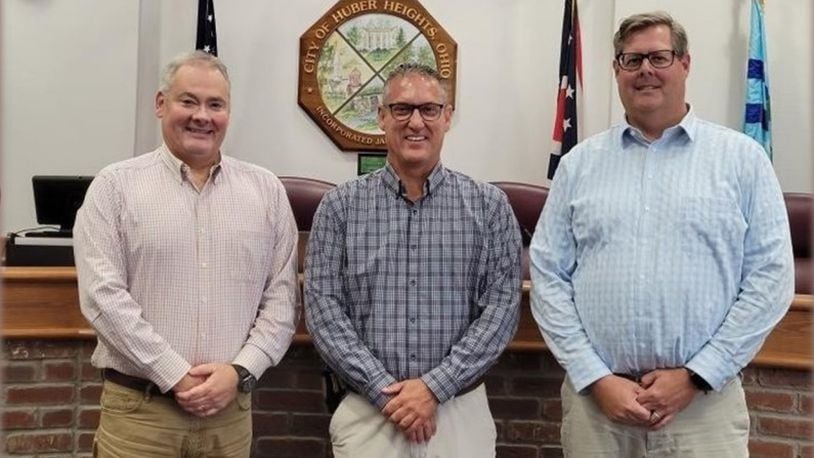 Huber Heights's management team includes city manager John Russell, center, and assistant city managers Alex Zaharieff, left and Aaron Sorrell, right. Contributed photo