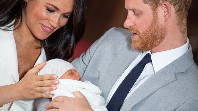 Prince Harry, Duke of Sussex and Meghan, Duchess of Sussex, pose with their newborn son Archie Harrison Mountbatten-Windsor during a photocall in St George's Hall at Windsor Castle on May 8, 2019 in Windsor, England. The Duchess of Sussex gave birth at 05:26 on Monday 06 May, 2019. On May 17, the baby's place of birth was revealed to be Portland Hospital in London.