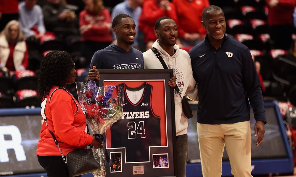 Dayton's Kobe Elvis is honored on Senior Day before a game against Virginia Commonwealth on Friday, March 8, 2024, at UD Arena. David Jablonski/Staff