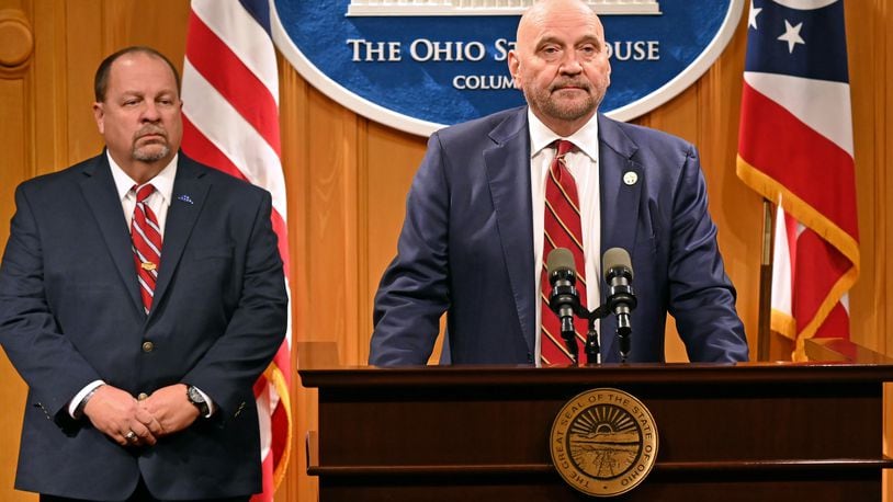 State Rep. Tom Young, R-Washington Twp., (right) discusses establishing a penalty for the mutilation of a deceased animal as part of legislation outlined at a press conference at the Ohio Statehouse in Columbus Wednesday, Nov. 15, 2023. Young was joined Sgt. Jeff Muncy of the Miamisburg Police Department (left), who thanked Young for putting the bill together after a Miamisburg student couldn't be charged for stabbing the corpse of a dog that was struck and killed by a vehicle. CONTRIBUTED