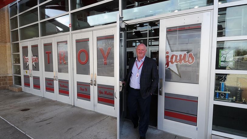 Troy schools Superintendent Chris Piper walks out the entrance of the high school Friday Feb. 3, 2023. MARSHALL GORBY\STAFF