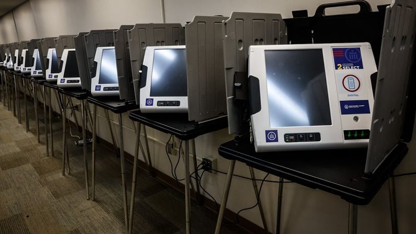 Electronic voting machines are lined-up and ready to go at the Montgomery County Board of Elections on East Third Street. JIM NOELKER/STAFF