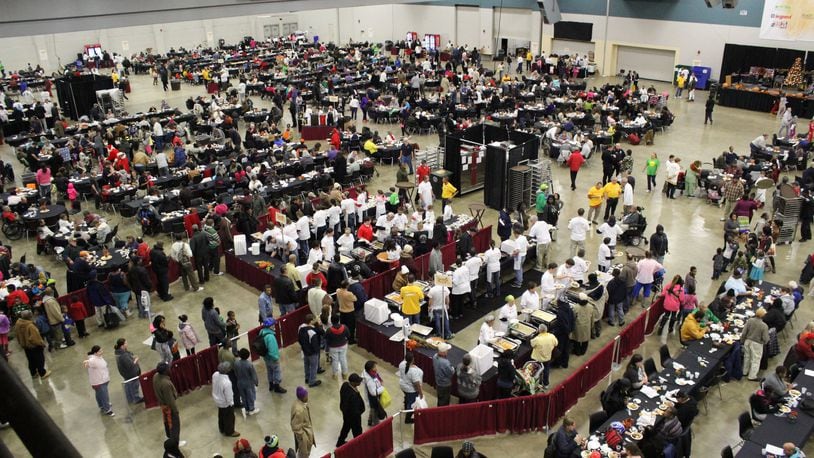 Thousands were fed a hot Thanksgiving Day meal during A Feast of Giving at the Dayton Convention Center Thursday, Nov. 26, 2015.