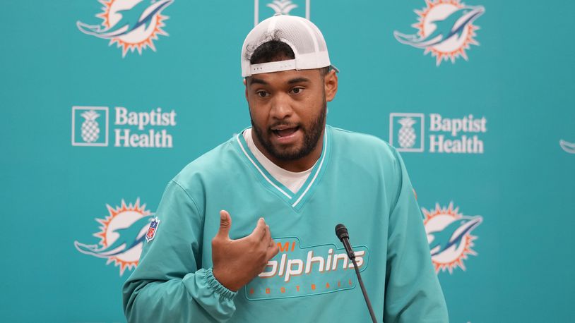 Miami Dolphins NFL football quarterback Tua Tagovailoa speaks during a media availability, Tuesday, Sept. 10, 2024, at the Dolphins training facility in Miami Gardens, Fla. (AP Photo/Wilfredo Lee)