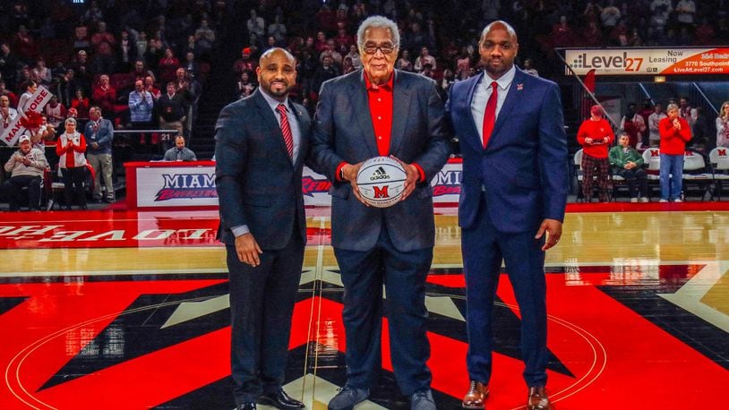 Wayne Embry is presented with a basketball on Wayne Embry Day on Saturday at Millett Hall in Oxford. Embry, a 1958 Miami grad, ranks 12th all-time on Miami’s scoring list and second in rebounds. Embry is in the Miami Hall of Fame and the College Basketball Hall of Fame. After a successful NBA career, he became the first African-American general manager in NBA history. He was elected to the Naismith Hall of Fame in 1999 for his on and off the court accomplishments. Embry (center) is pictured with Miami head coach Jack Owens (left) and Miami assistant Damon Frierson. CONTRIBUTED