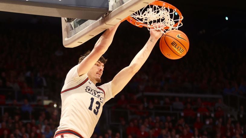 Dayton's Isaac Jack dunks against Youngstown State on Friday, Nov. 24, 2023, at UD Arena. David Jablonski/Staff