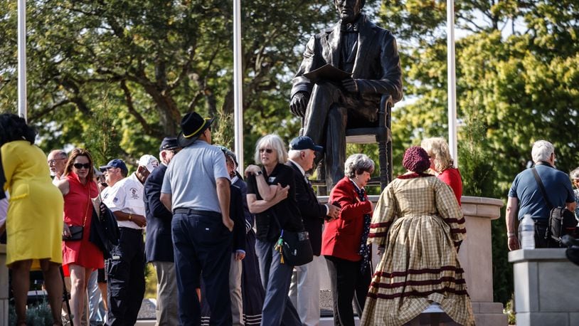 Hundreds of people watched the unveiling of the Lincoln statue at the Dayton VA Medical Center Monday September 16, 2024. Jim Noelker/Staff