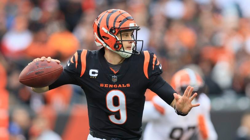 Cincinnati Bengals quarterback Joe Burrow throws during the first half of an NFL football game against the Cleveland Browns, Sunday, Dec. 11, 2022, in Cincinnati. (AP Photo/Aaron Doster)