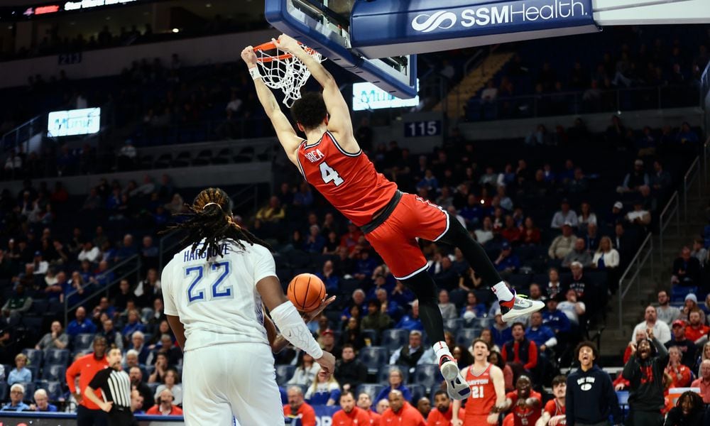 Dayton's Koby Brea dunks against Saint Louis on Tuesday, March 5, 2024, at Chaifetz Arena in St. Louis, Mo. David Jablonski/Staff