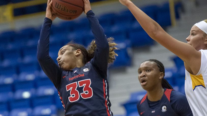 Dayton's Destiny Bohanon grabs a rebound against Morehead State on Nov. 25, 2020, in Morehead, Ky. Photo by John Flavell