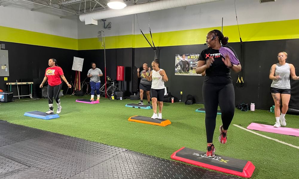 Courtney Ely, who owns CME Sweat Fitness, teaches Xtreme Hip-Hop step classes at DNSFit Studio, 4616 Salem Ave. in Trotwood. NATALIE JONES/STAFF