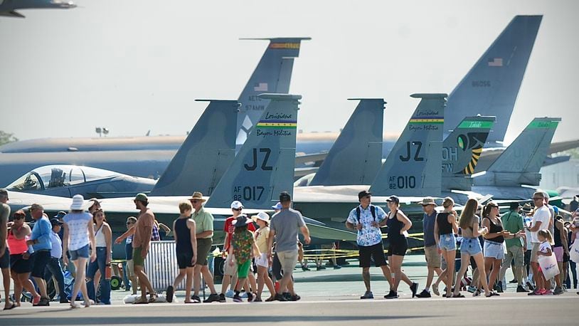 Dayton Air Show attendants wait to see inside several aircrafts on display at the 2023 event. MARSHALL GORBY \STAFF