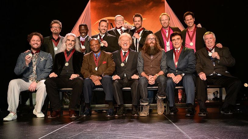 NASHVILLE, TN - APRIL 29:  GMA Hall of Fame Inductees (back row L-R) Todd Suttles, Buddy Mullins, Lee Young, Adam Crabb, Marshall Hall, Wes Hampton, (front row L-R) David Phelps, Guy Penrod, Larnelle Harris, Bill Gaither, Gary McSpadden, Jim Murray, and Russ Taff of Gaither Vocal Band and David Crowder (third from right) attend the GMA Honors Celebration and Hall of Fame Induction at the Allen Arena at Lipscomb University on April 29, 2014 in Nashville, Tennessee.  (Photo by Rick Diamond/Getty Images for GMA)