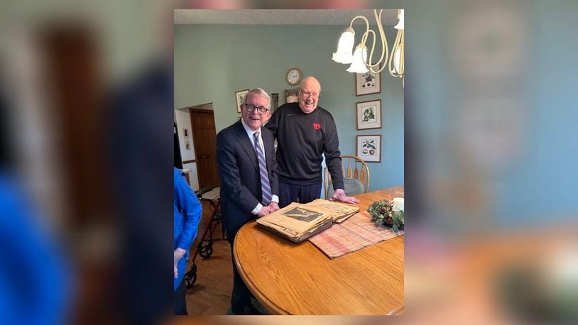 Ohio Governor Mike DeWine grew up a Dayton Flyers fan. As an 8-year-old boy in Yellow Springs, he kept a scrapbook of the 1955-56 Flyers team where Bockhorn was one of the stars alongside guys like Bill Uhl, Jim Paxson  and Jim Palmer. Nine days ago DeWine visited Bockhorn and his wife Peggy at their Bellbrook home and gave the UD legend a copy of the scrapbook. Laura Scheper/CONTRIBUTED