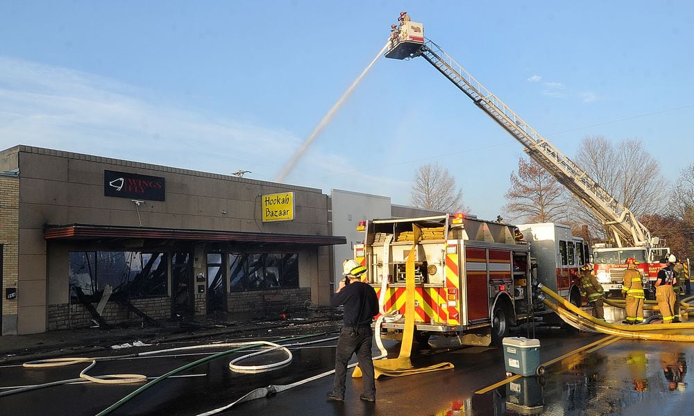 Two businesses suffered heavy fire damage in the 900 block of Patterson Road Thursday morning, March 14, 2024. The cause of the fire remains under investigation. MARSHALL GORBY\STAFF