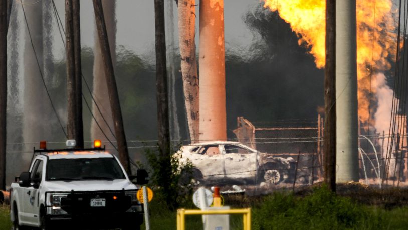 FILE - A massive pipeline fire burns after a vehicle drove through a fence along a parking lot and struck an above-ground valve near Spencer Highway and Summerton on Monday, Sept. 16, 2024, in La Porte, Texas. (Brett Coomer/Houston Chronicle via AP)