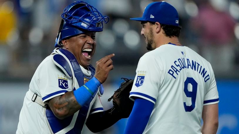 Kansas City Royals' Salvador Perez, left, celebrates with Vinnie Pasquantino (9) during after their baseball game against the Los Angeles Angels Monday, Aug. 19, 2024, in Kansas City, Mo. The Royals won 5-3. (AP Photo/Charlie Riedel)