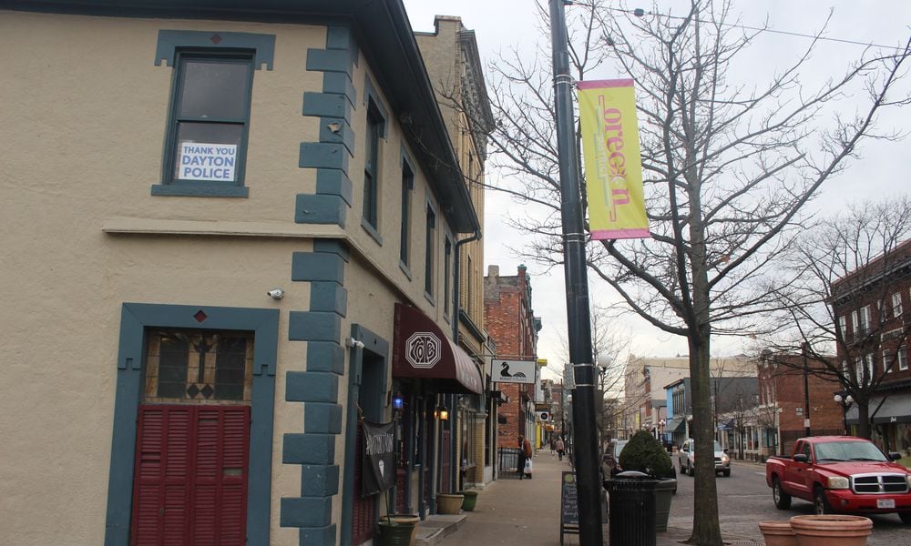 Six months after a 24-year-old Bellbrook man killed nine people in the Oregon District during the worst mass shooting in Ohio history, literal signs of strength, appreciation, resilience and the determination to “do something” about gun violence can be found throughout the historic neighborhood. A 