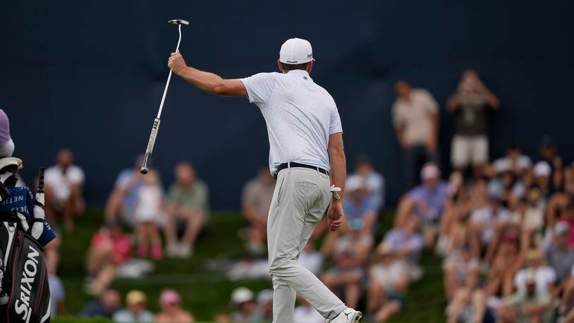 Keegan Bradley reacts after missing a putt on the 17th green during the third round of the BMW Championship golf event at Castle Pines Golf Club, Saturday, Aug. 24, 2024, in Castle Rock, Colo. (AP Photo/Matt York)