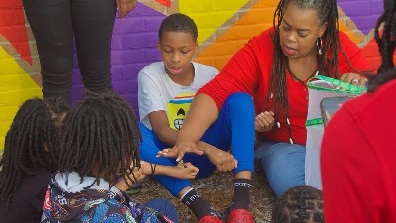 The Boys and Girls Club learns about butterflies. CONTRIBUTED