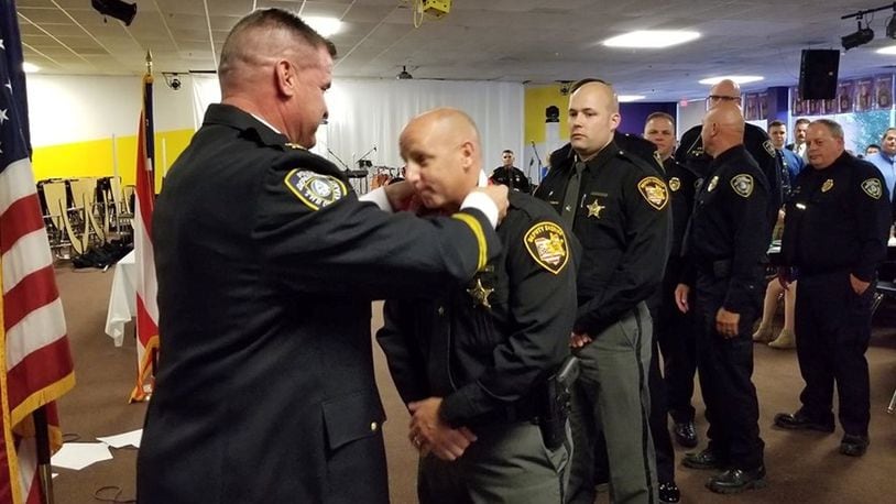 Miami Twp. Police Chief Charlie Stiegelmeyer recognized several officers and staff during an awards banquet Saturday night. CONTRIBUTED