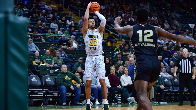 Wright State's Tanner Hudson shoots over Oakland's Tuburu Naivalurua during a game at the Nutter Center on Feb. 10, 2024. Joe Craven/Wright State Athletics