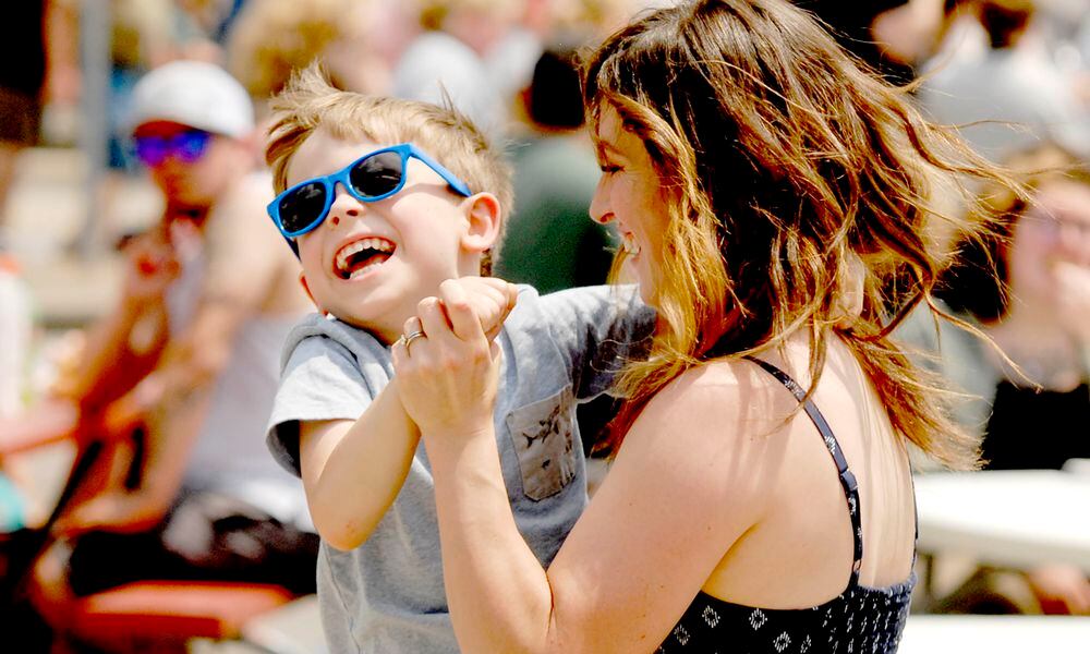 Festive fun at the Troy Strawberry Festival, which returns June 1-2 in Troy. DAVID A. MOODIE/CONTRIBUTING PHOTOGRAPHER