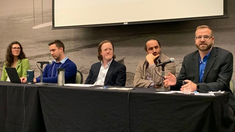 A Wright State university panel talks about artificial intelligence in the business world. From left, Lori Mahoney, Nick Kovacs, Clayton Rothwell, Julio Mateo, and Alex Gutman. LONDON BISHOP/STAFF
