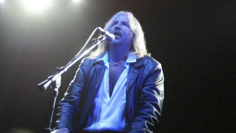 FILE - Singer Jack Russell, of the band Great White, performs during a benefit to honor the memory of the band's guitarist Ty Longley at the Key Club in West Hollywood, Calif., on April 29, 2003. Russell, the lead singer of the bluesy ’80s metal band Great White whose hits included “Once Bitten Twice Shy” and “Rock Me” and was fronting his band the night 100 people died in a 2003 nightclub fire in Rhode Island, has died. He was 63. (AP Photo/Jill Connelly, file)