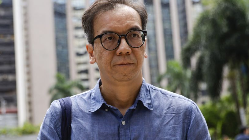 Chung Pui-kuen, the former chief editor of Hong Kong's now shuttered pro-democracy news outlet Stand News, arrives at the Wanchai District Court ahead of the final sentencing of Stand News sedition case in Wan Chai district court in Hong Kong on Thursday, Sept. 26, 2024. (AP Photo/May James)