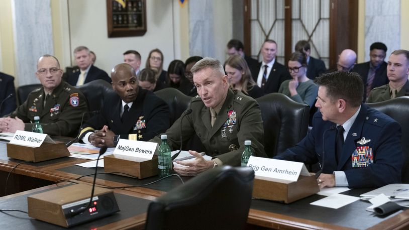 From left, Major General Johnny K. Davis, USA, Commanding General, United States Army Recruiting Command; Rear Admiral Alexis T. Walker, USN, Commander, Navy Recruiting Command; Major General William J. Bowers, USMC, Commanding General, Marine Corps Recruiting Command and Brigadier General Christopher R. Amrhein, USAF, Commander, Air Force Recruiting Service testify before the Senate Armed Services Subcommittee on Personnel hearing to examine the status of Department of Defense recruiting efforts and plans for fiscal year 2024, on Capitol Hill in Washington Wednesday, Dec. 6, 2023, (AP Photo/Jose Luis Magana)