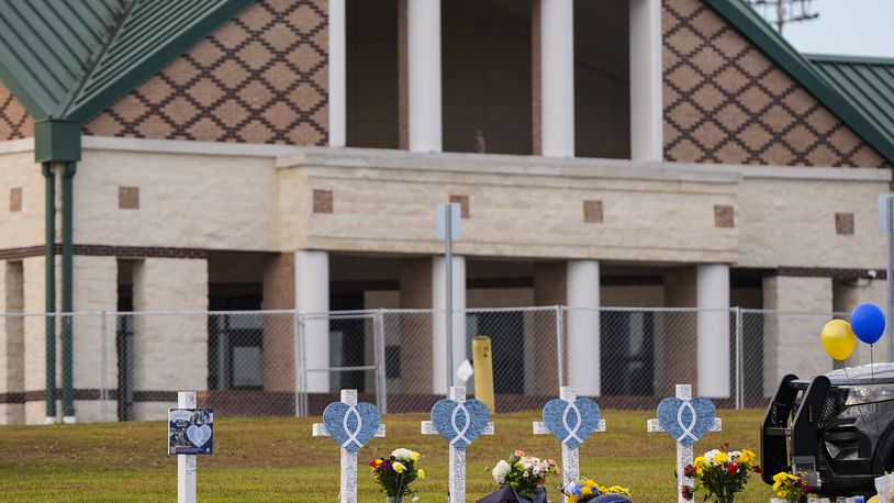 A memorial is seen at Apalachee High School after the Wednesday school shooting, Saturday, Sept. 7, 2024, in Winder, Ga. (AP Photo/Mike Stewart)