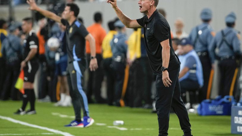 FILE - Canada's coach Jesse Marsch instructs his players during a Copa America semifinal soccer match against Argentina in East Rutherford, N.J., July 9, 2024. (AP Photo/Pamela Smith, File)