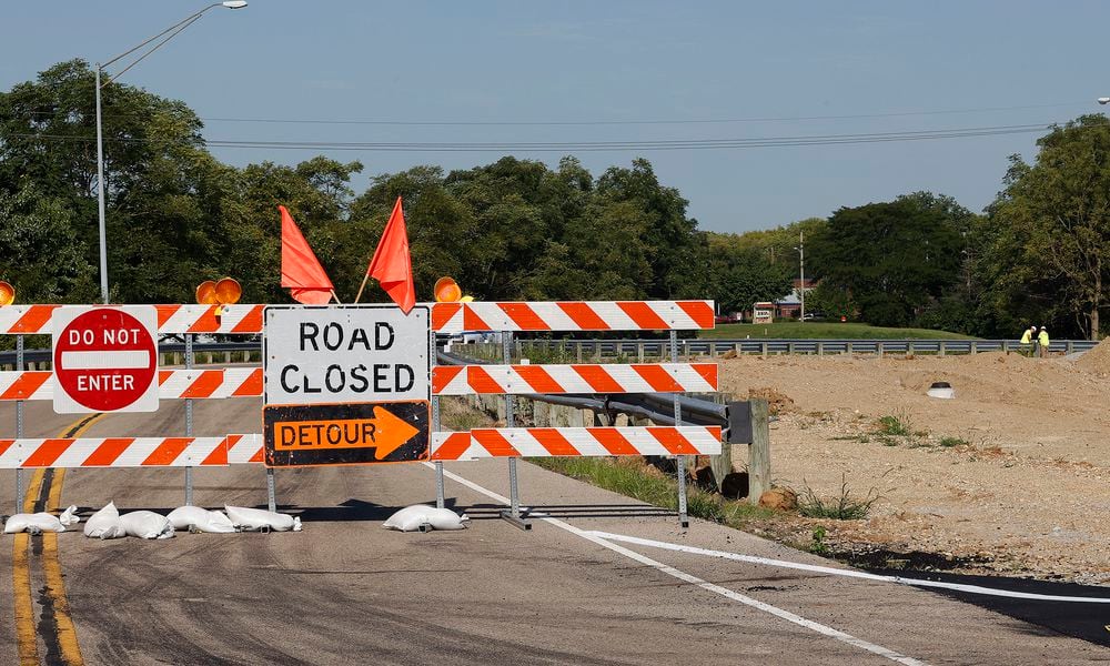 Manchester Road at E. Dixie Drive is closed in West Carrollton. Manchester Road traffic is being routed onto a temporary roadway through the old Roberds site. MARSHALL GORBY\STAFF