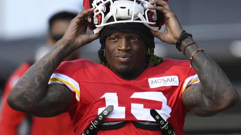 FILE - Kansas City Chiefs wide receiver Kadarius Toney walks to the field at the start of an NFL football training camp, July 27, 2024, in St. Joseph, Mo. (AP Photo/Reed Hoffmann, File)