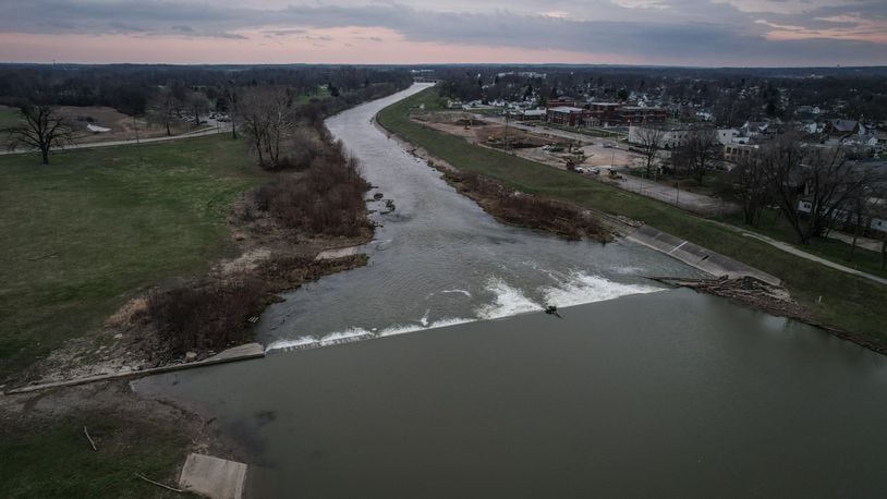 This is an aerial photo of a low-head dam on the Great Miami River near East Water Street in Troy. JIM NOELKER/STAFF