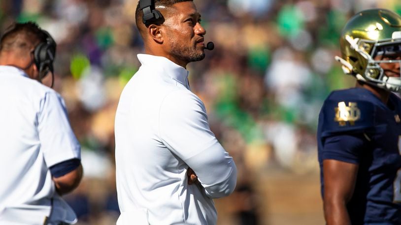 Notre Dame head coach Marcus Freeman looks to the scoreboard during an NCAA college football game against Northern Illinois, Saturday, Sept. 7, 2024, in South Bend, Ind. (AP Photo/Michael Caterina)