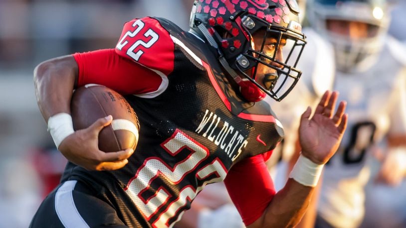 Franklin’s Ryan Montgomery carries the ball during their game against Valley View on Friday night at Veterans Memorial Field at Atrium Stadium in Franklin. NICK GRAHAM/STAFF